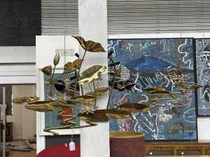 Bijan Bahar (1936-2013), (Lotus pond) 1987, brass and aluminium wall sculpture