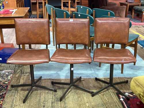 Three mid-century kitchen chairs