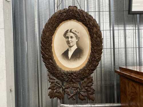 Antique carved timber laurel wreath frame with photographic portrait