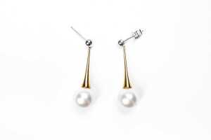 A pair of South Sea pearl drop earrings in 18 carat two tone gold