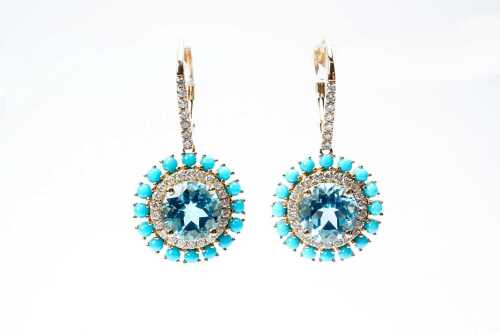 A pair of blue topaz, diamond and turquoise earrings in 14 carat yellow gold