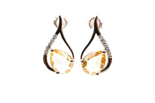 A pair of citrine and diamond earrings in 9 carat yellow gold