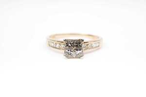 A diamond ring in 9 carat yellow gold
