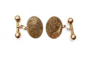 A pair of antique cufflinks in 9 carat yellow gold