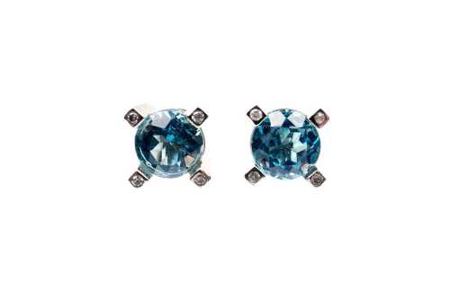 A pair of Swiss blue topaz and diamond earrings in 9 carat yellow gold