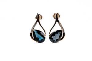 A pair of London blue topaz and diamond earrings in 9 carat yellow gold