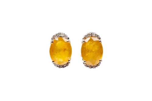 A pair of yellow sapphire and diamond earrings in 9 carat yellow gold