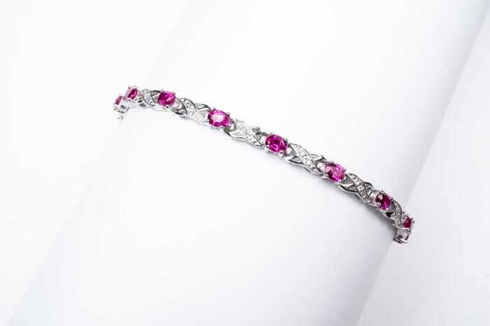 A ruby and diamond bracelet in 9 carat white gold