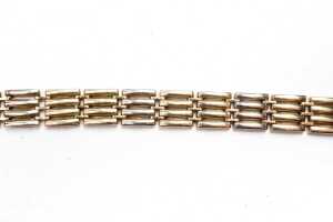An Italian gate link bracelet in 14 carat yellow and white gold - 2