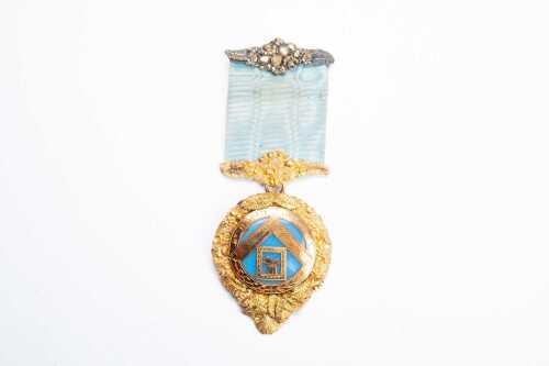 An antique Masonic medallion dated 1871, in 18 carat gold