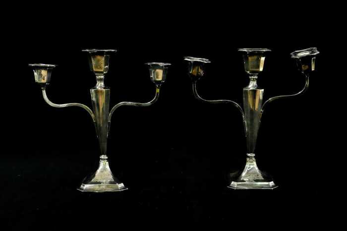 Pair of antique English weighted sterling silver candelabra