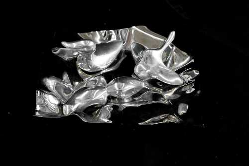 Three Gordon Hoselton animal figures and a George Jensen Verner Panton tray
