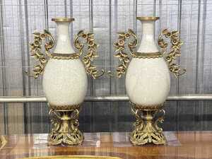 Pair of white crackle-glazed ormolu mounted ceramic urns