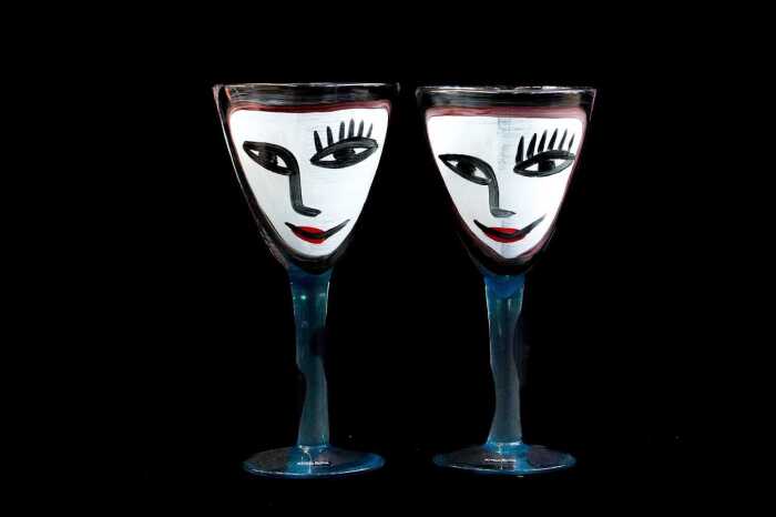 Ulrica Hydman Vallien (1938-2018) for Kosta Boda, pair of 'Open Minds' hand-painted blue glass goblets
