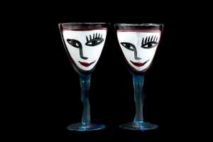 Ulrica Hydman Vallien (1938-2018) for Kosta Boda, pair of 'Open Minds' hand-painted blue glass goblets