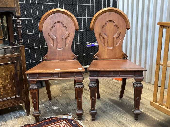 Pair of Victorian oak hall chairs