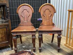 Pair of Victorian oak hall chairs