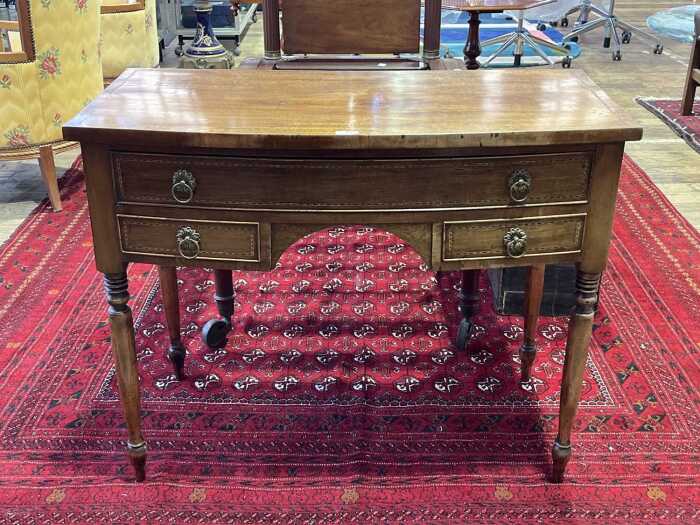 Early Victorian mahogany bow front ladies desk