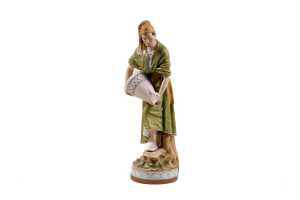 Royal Dux porcelain figure of a man holding a jug.