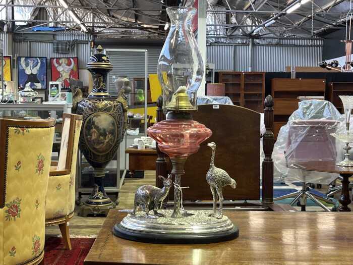 Antique OLC kerosene lamp mounted on a reproduction figural Australiana base