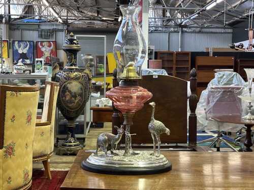 Antique OLC kerosene lamp mounted on a reproduction figural Australiana base