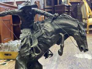 After Frederic Remington, Bronco Buster, cast bronze figure. - 2