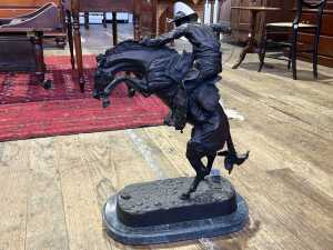 After Frederic Remington, Bronco Buster, cast bronze figure. - 5