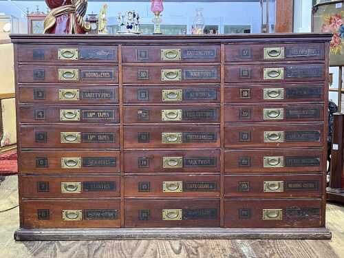 Antique draper's flight of haberdashery drawers