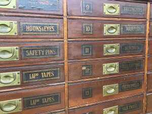 Antique draper's flight of haberdashery drawers - 3