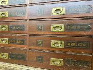 Antique draper's flight of haberdashery drawers - 4