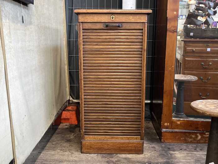 Antique oak tambour front office cabinet