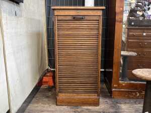 Antique oak tambour front office cabinet