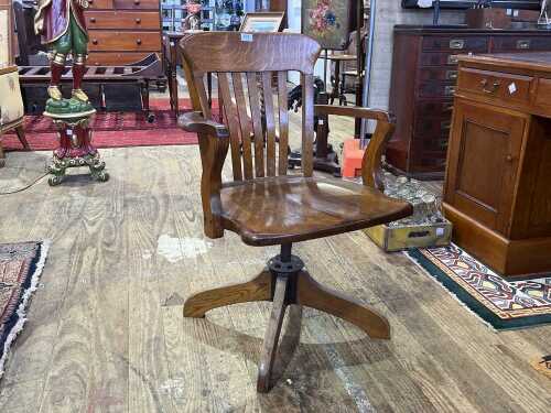 Antique oak captain's chair