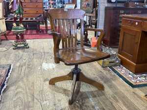 Antique oak captain's chair