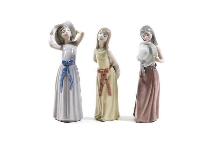 Three Lladro porcelain girl figures