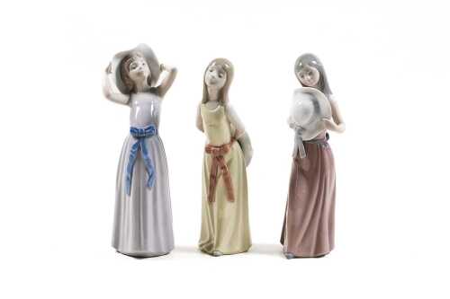 Three Lladro porcelain girl figures