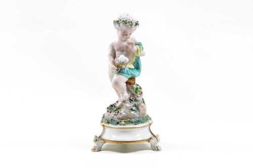 Meissen porcelain putto with globe figure