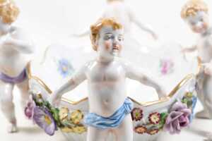 Antique Von Schierholz porcelain centerpiece bowl, with applied floral details and four cherub figures - 4