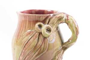 Remued drip glaze pottery jug with applied gumnut and leaf decoration - 2