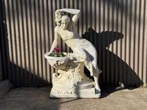 Art Nouveau style statue of a lady