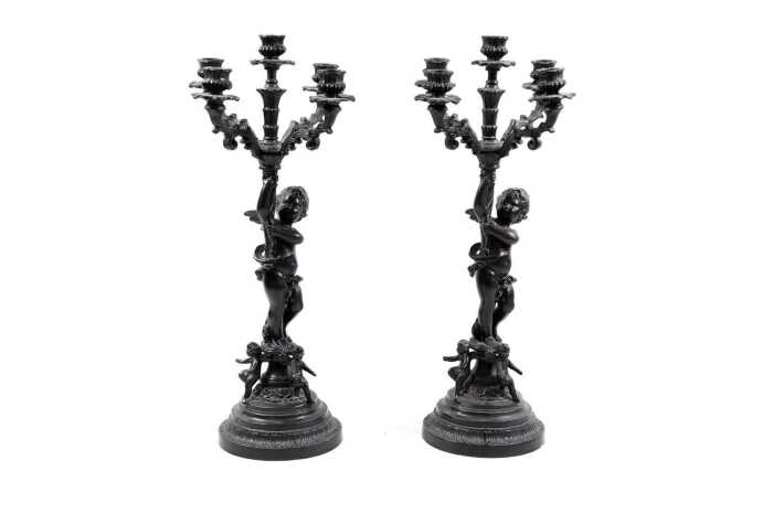 Pair of reproduction French Baroque cast metal cherub candelabra