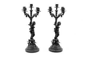 Pair of reproduction French Baroque cast metal cherub candelabra