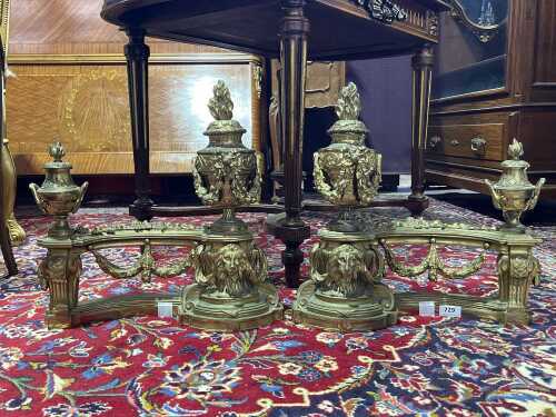Pair of antique French Empire style solid brass fire dogs