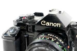 Canon A-1 SLR film camera with three lenses and accessories - 3