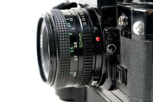 Canon A-1 SLR film camera with three lenses and accessories - 4