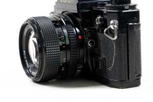 Canon A-1 SLR film camera with two lenses and accessories - 2