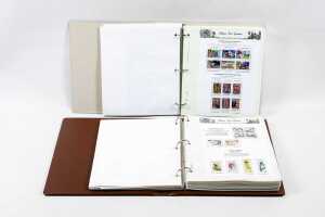 N.W Pacific Island, Papua New Guinea stamp albums in two slip cases
