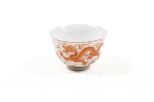 Twin dragon red porcelain tea cup