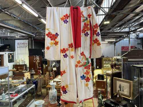 Traditional Japanese silk bridal kimono with flower and crane silk and gold thread embroidery