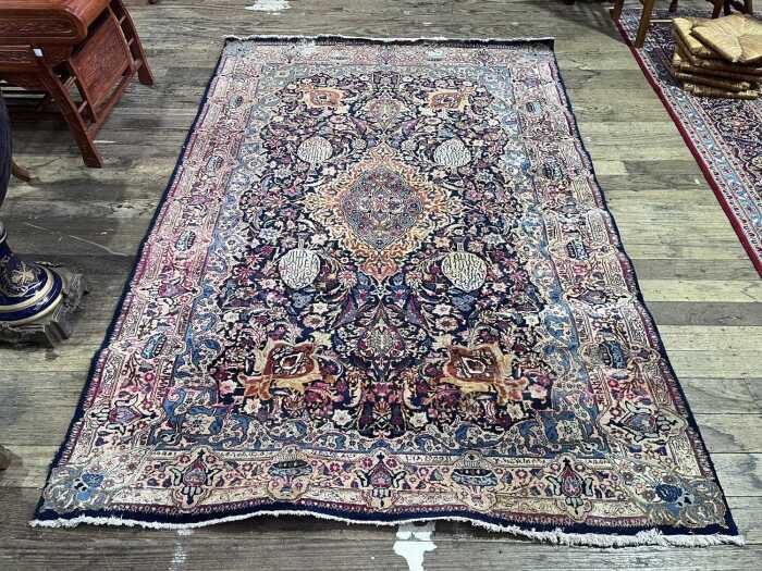 Persian hand-knotted woollen rug